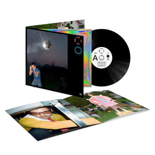 Harry Styles official merch black vinyl record packshot with holographic sleeve and collectible insert artwork.